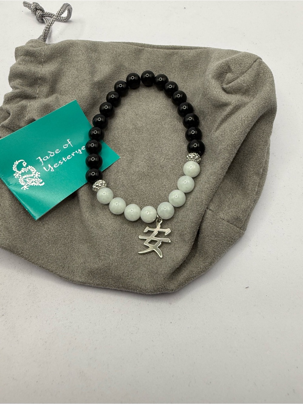 Black & White Beaded Bracelet with Silver Charm